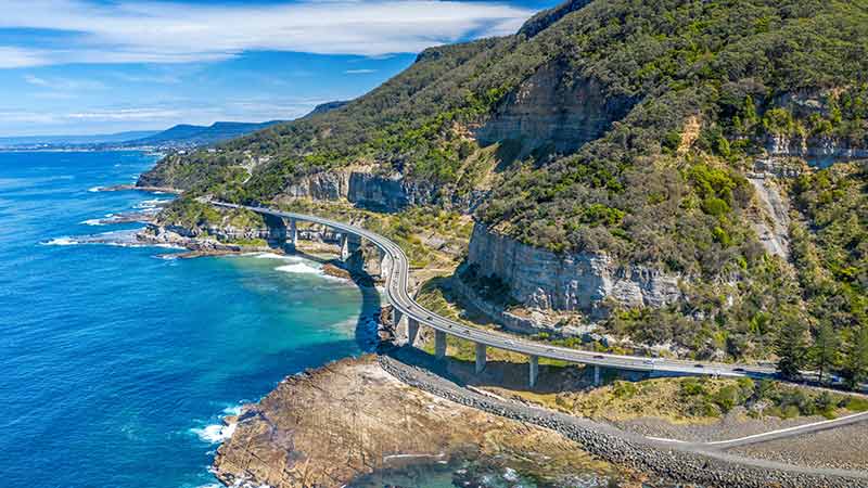 The scenic coastal drive along Sea Cliff Bridge, Clifton.